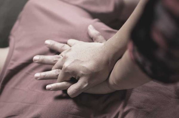 hands performing hands-only CPR on chest hands performing hands-only CPR on chest